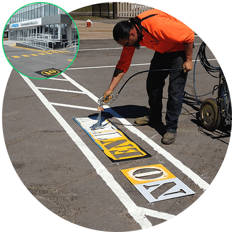 Man Painting On The Road