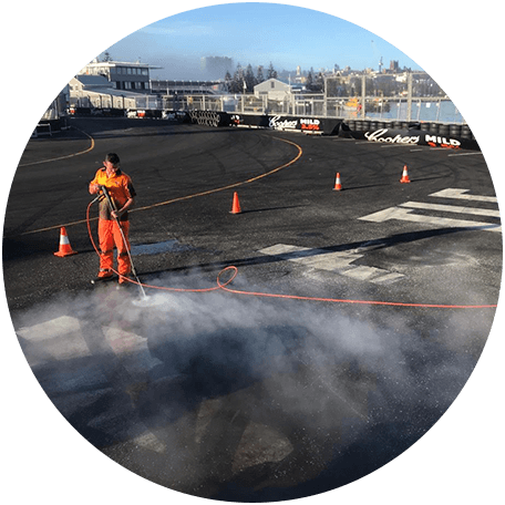 Man Removing Road Markings