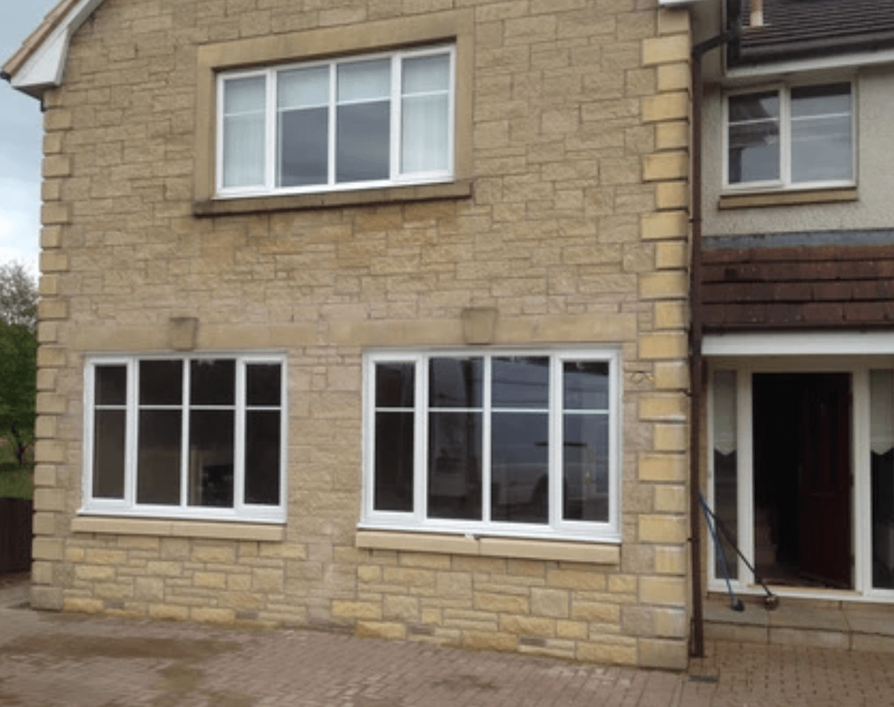 Double garage conversion with windows added