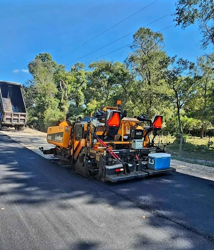 Measuring Wheel on A Freshly Paved Road — Sealy, TX — Sealy Paving, Inc.