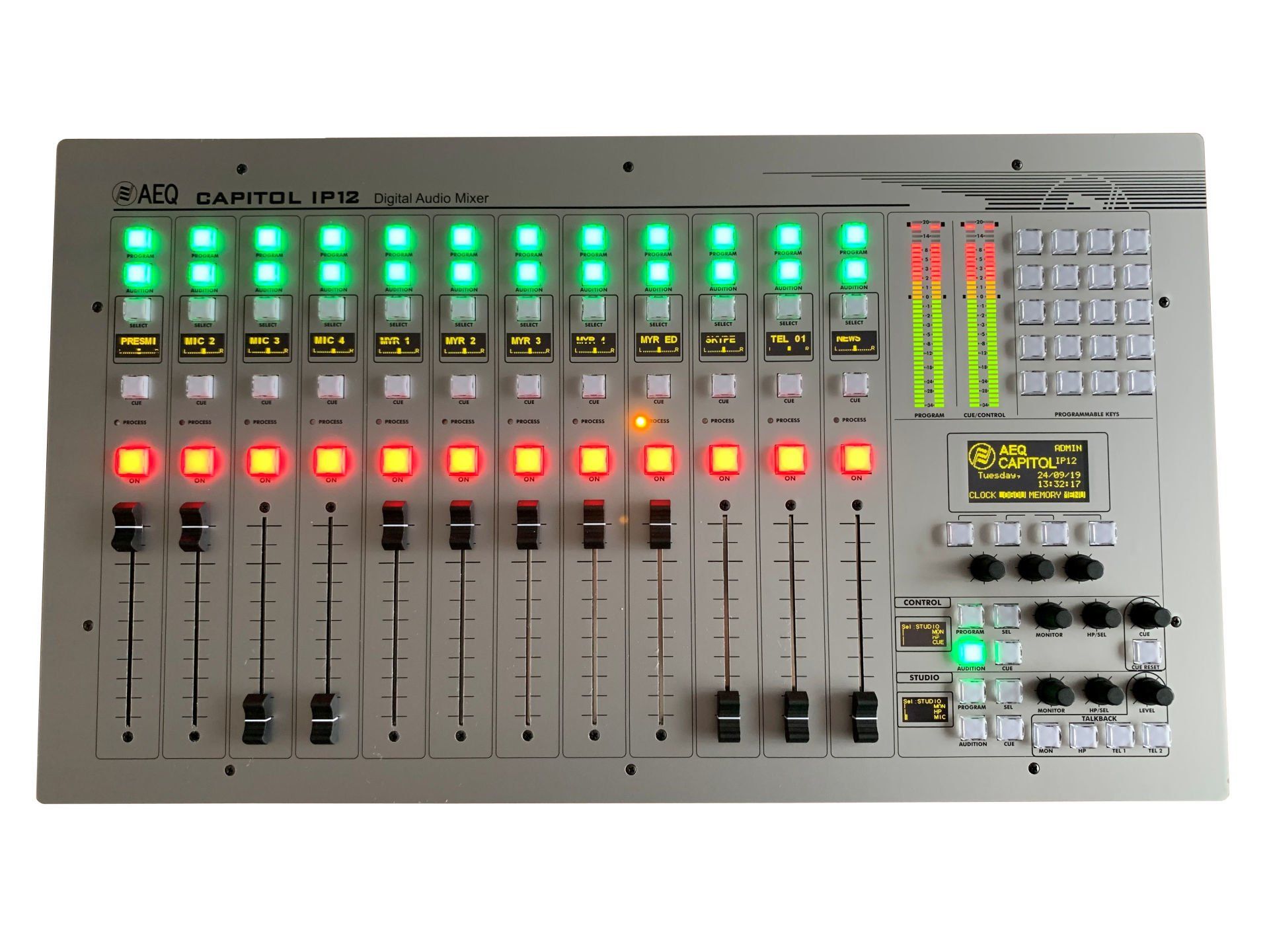 A mixer with a bunch of knobs and lights on it