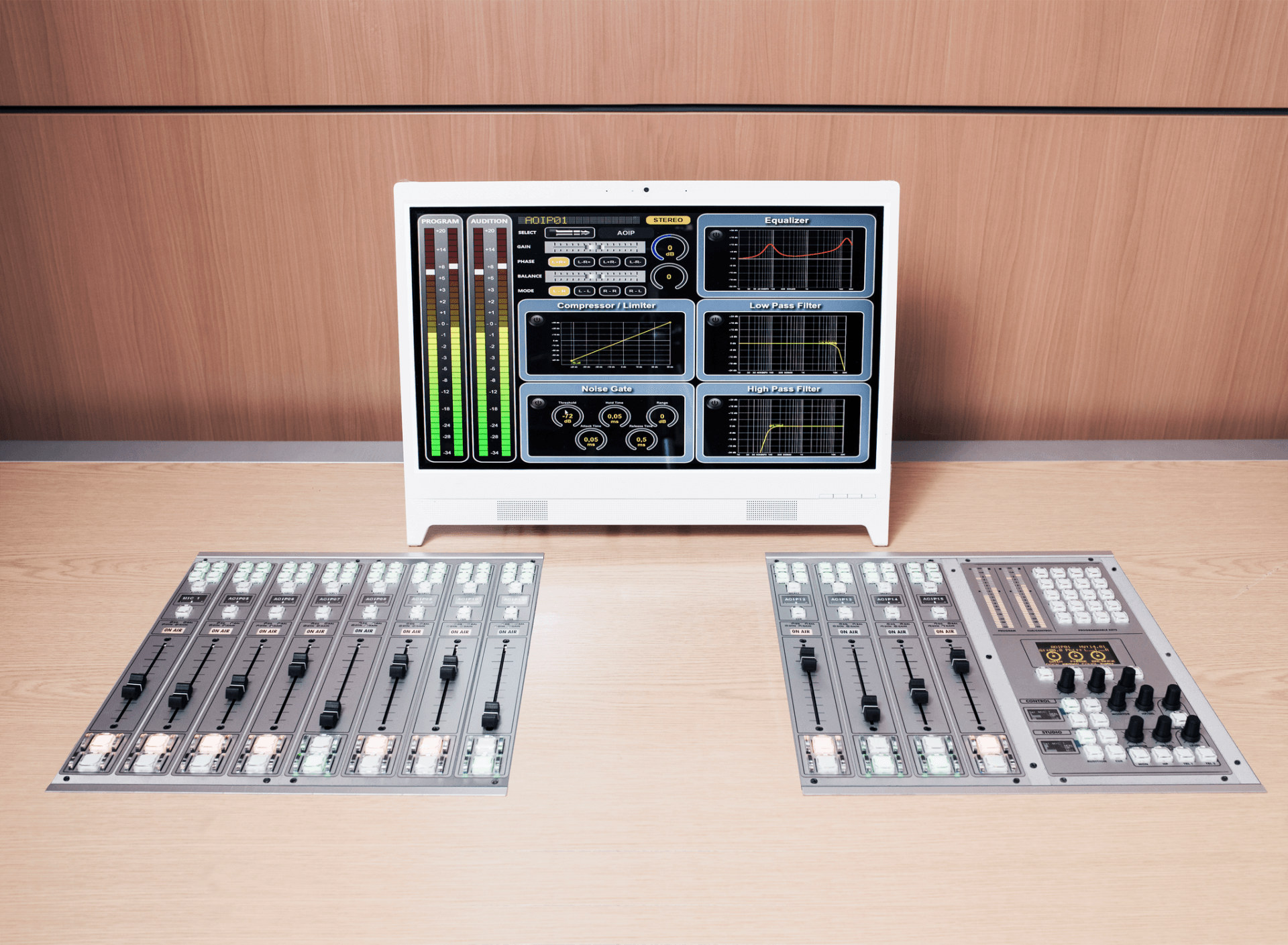 A computer monitor is sitting on top of a wooden table next to two mixers.