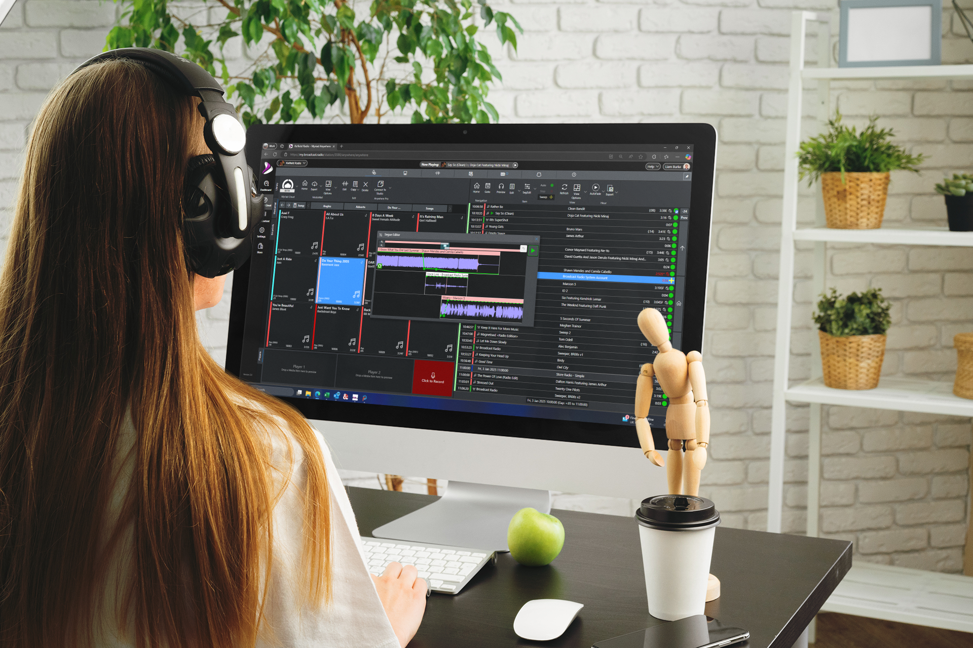 Modern radio broadcasting workspace in 2026 with cloud-connected radio software, microphone, and headphones, illustrating advanced studio setup.