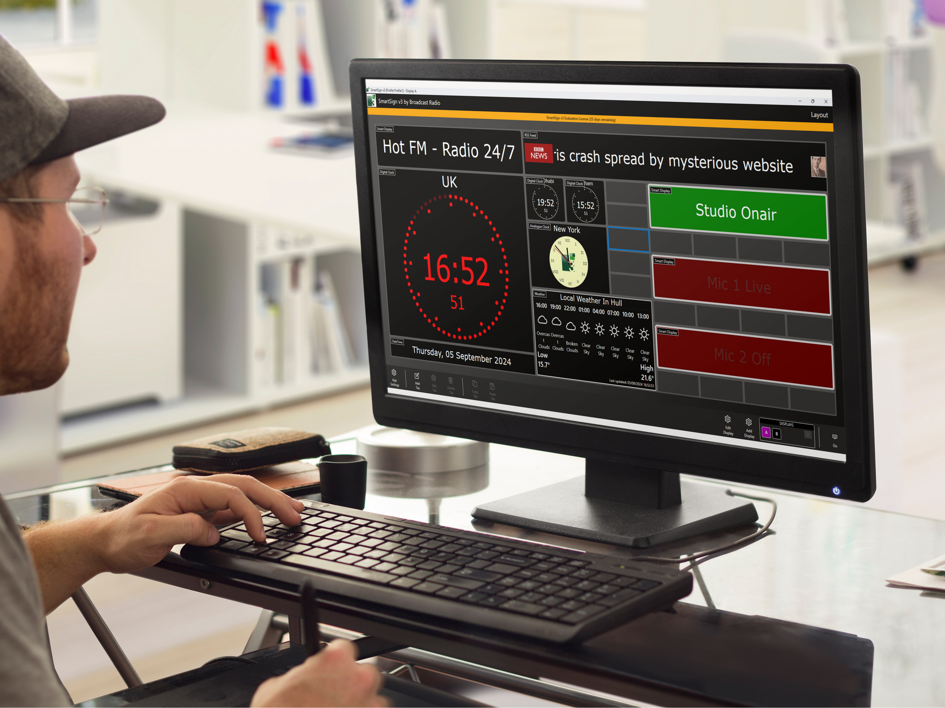 Person designing a SmartSign layout.