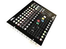 A black and white keyboard with a bunch of buttons on it.