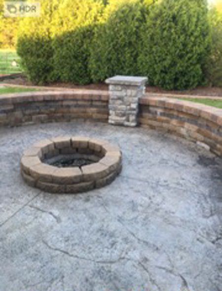 Close-up shot of a fire pit in the middle of the patio