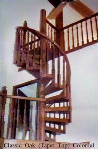 A spiral staircase made of classic oak taper top colonial