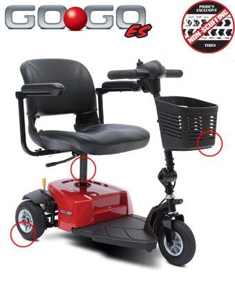 Red and black GoGo ES mobility scooter with basket. Includes circled areas.