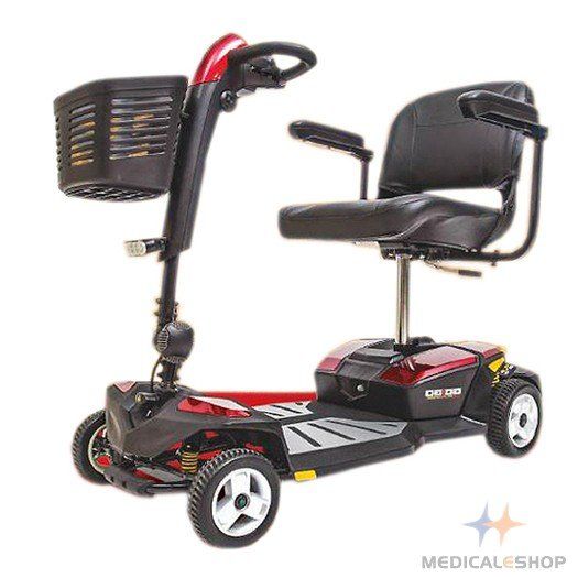 Red and black mobility scooter with basket, seat, and armrests on a white background.