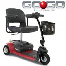 Red and black Go Go Ultra X mobility scooter with a basket and seat.