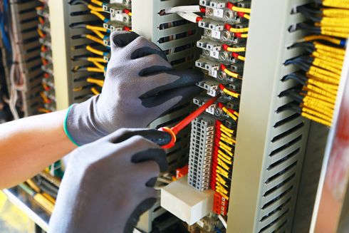 Industrials — Man Fixing Wires in Aledo, TX