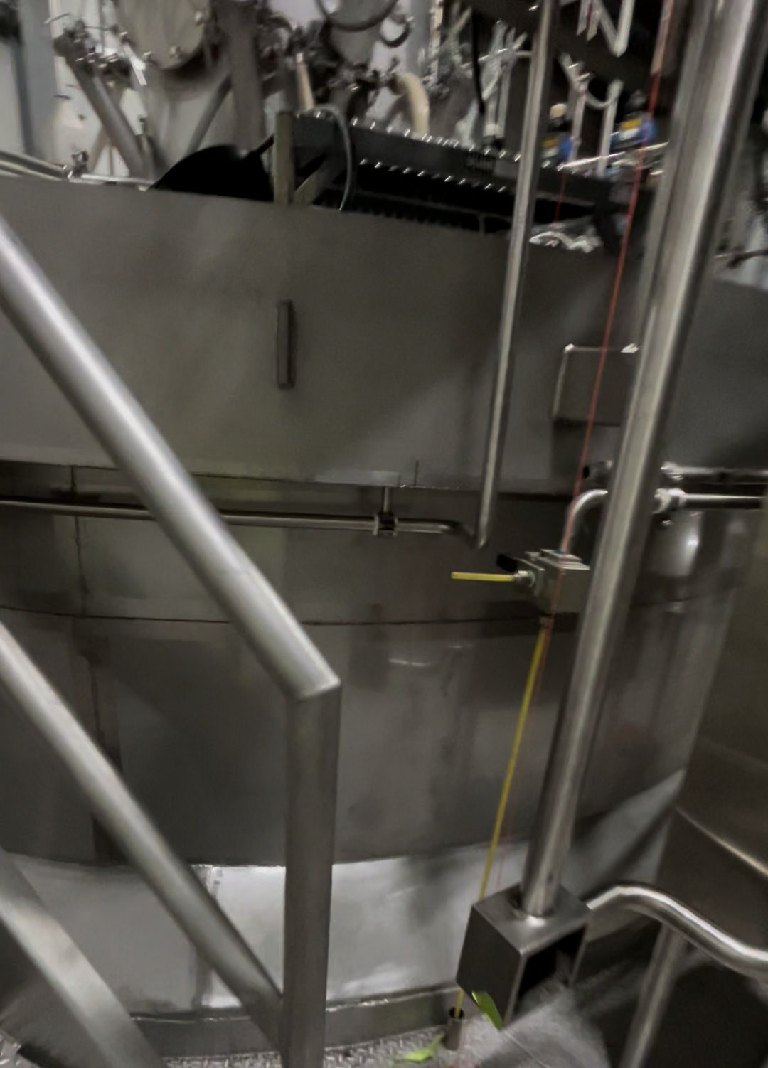 A staircase leading up to a machine with the letter n on it