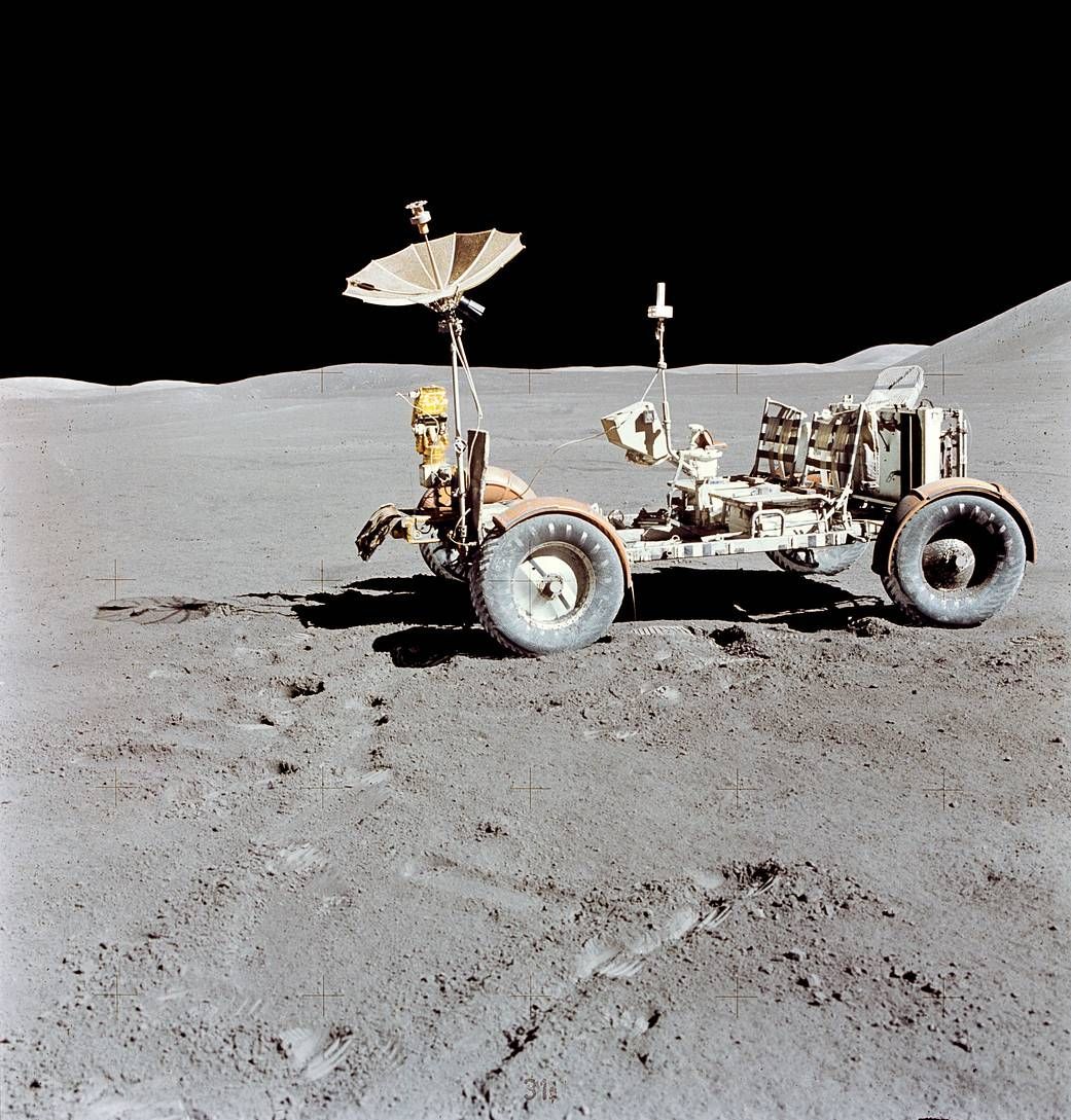 A rover is parked on the surface of the moon