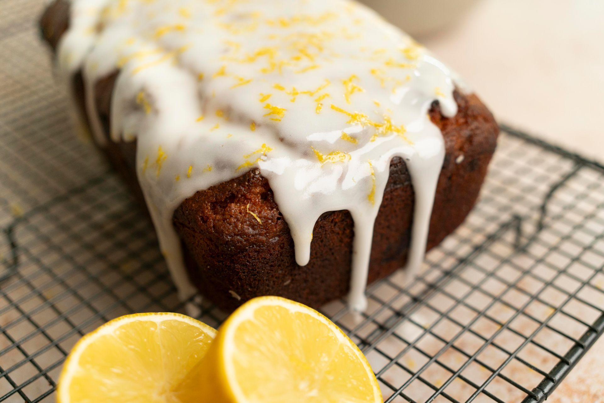 blueberry loaf with white icing and lemon 