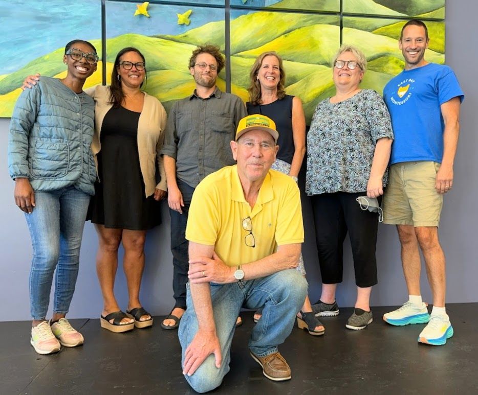 The Board of Directors pose for a picture together.