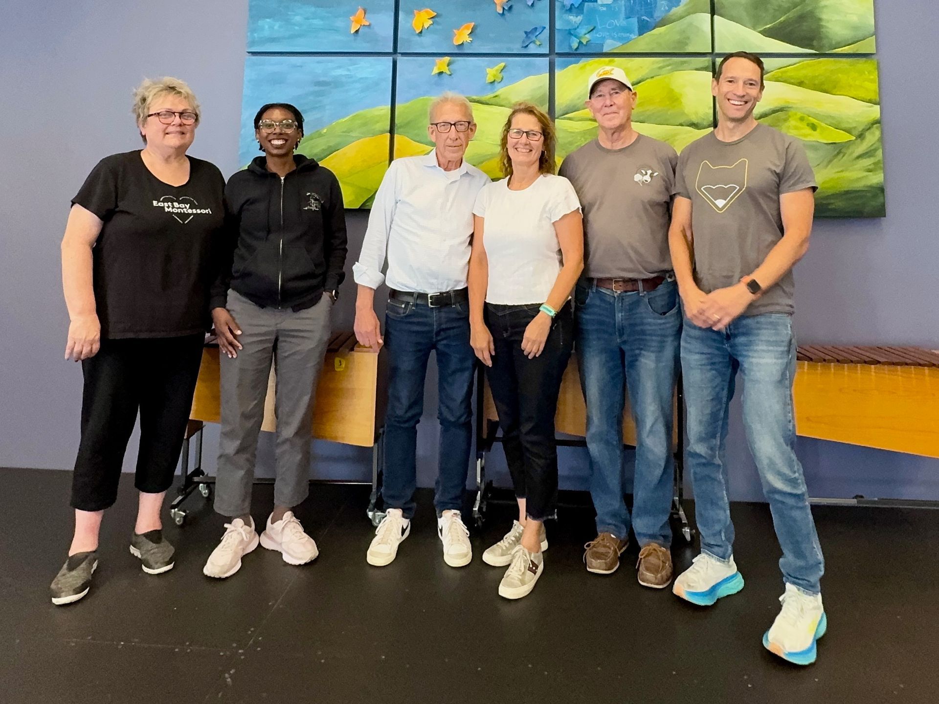 The Board of Directors pose for a picture together.