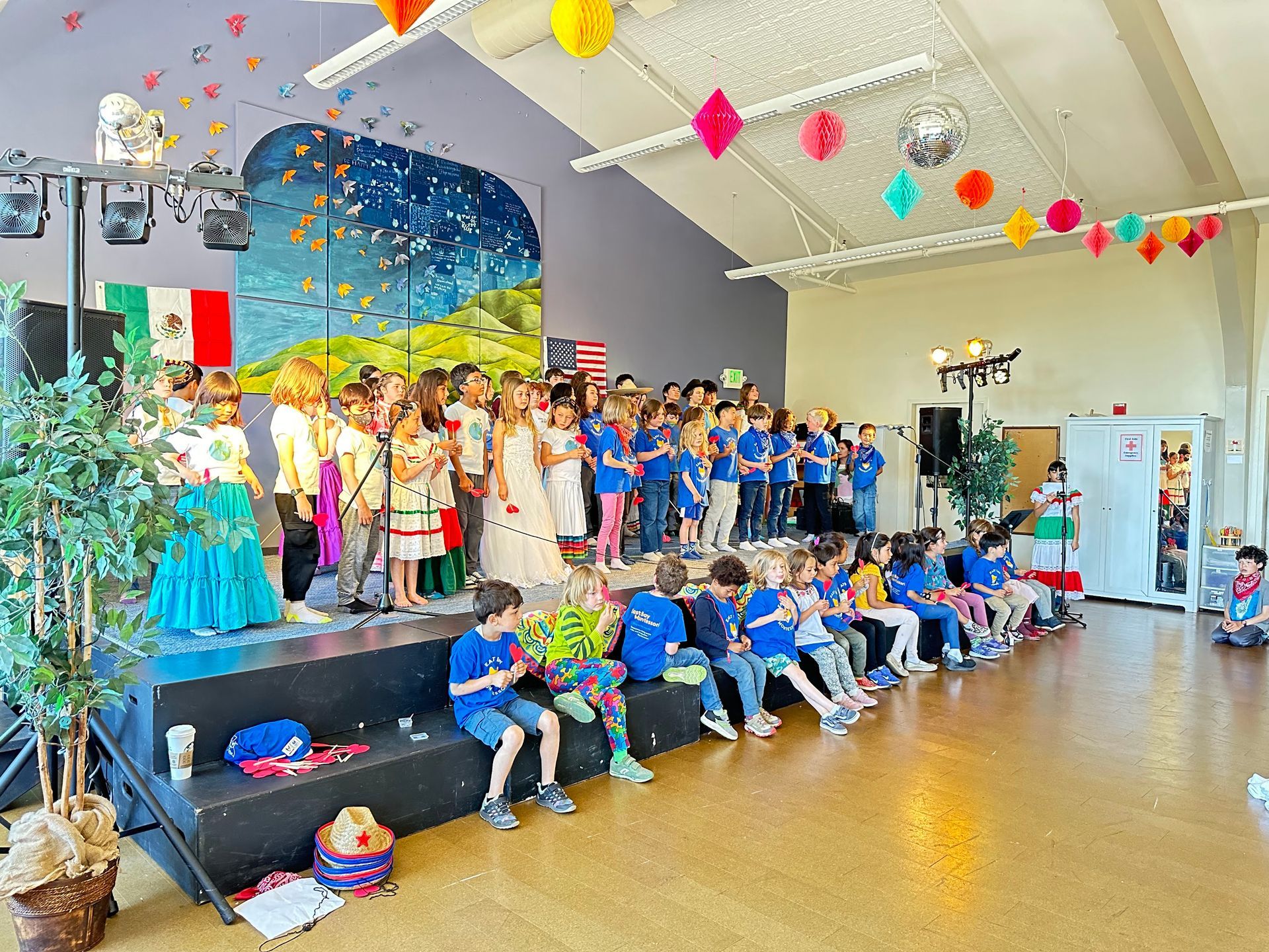 The entire school stands on stage to sing a song together for the Cinco de Mayo Festival.