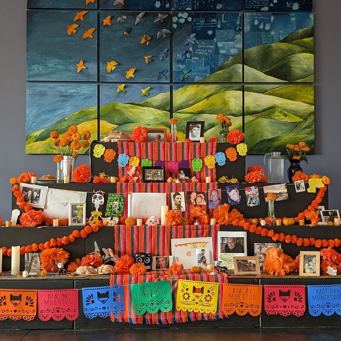 The annual Ofrenda is on display for Dia de los Muertos. Students throughout the school bring photos of loved ones to honor and remember.