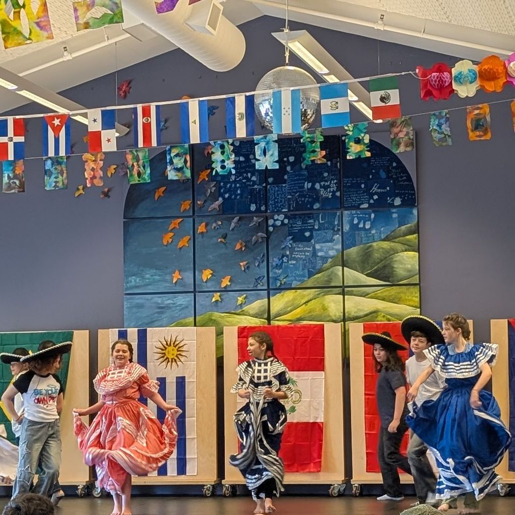 A group of students performs a traditional dance at our annual Hispanic Heritage Cultural Event.