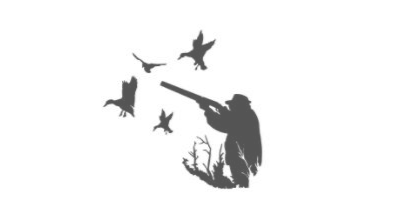 Black silhouette of a person aiming a rifle at flying birds near a barren tree and shrubs