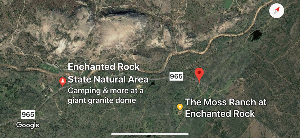Google Maps satellite view of Enchanted Rock, showing trail markers and campground labels nearby