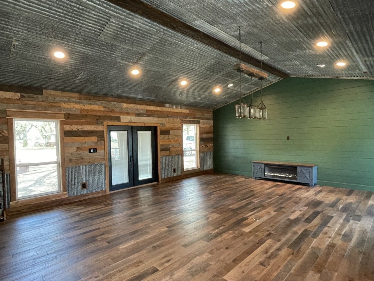 There is a fireplace in the middle of the room.