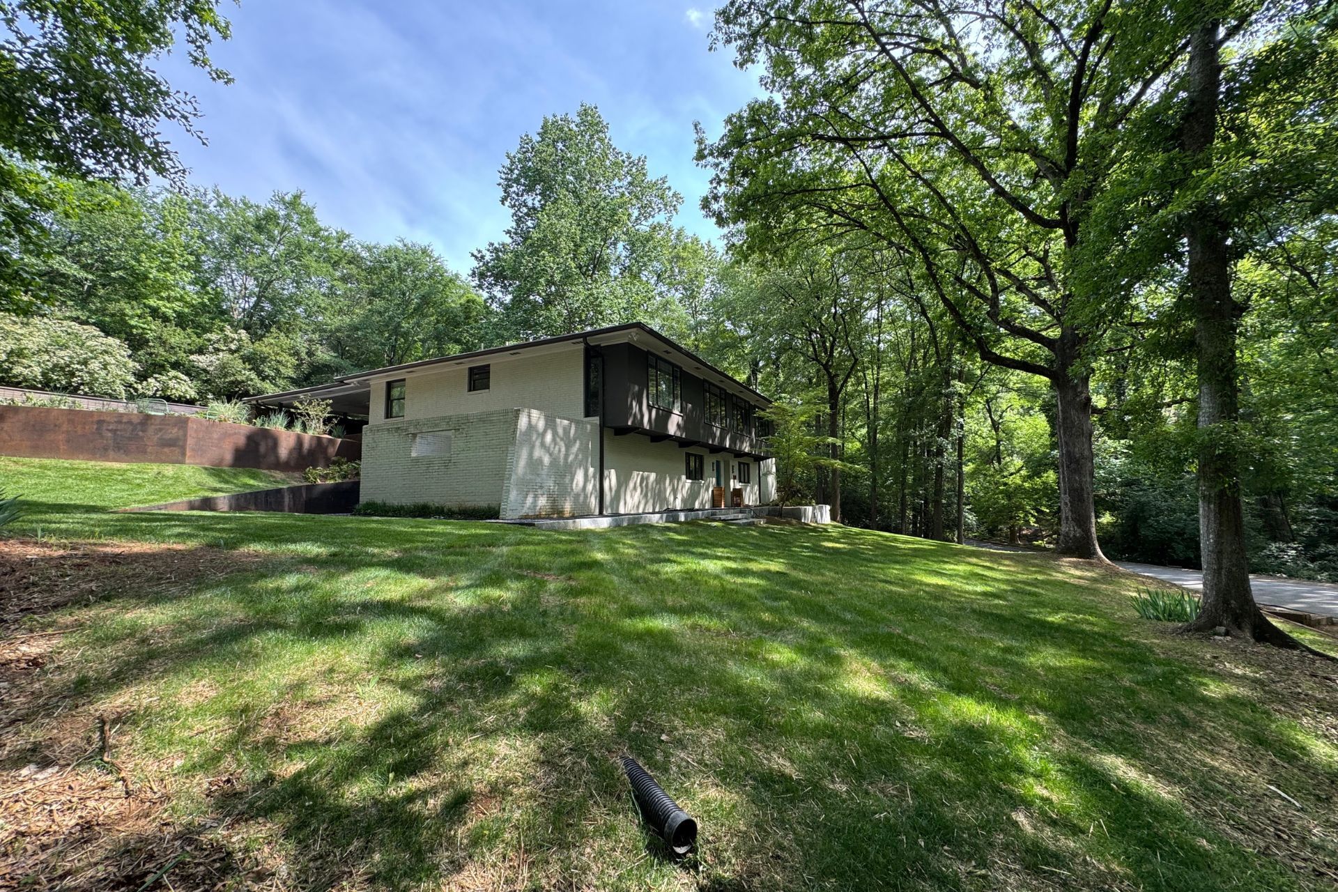 A photo of a peaceful lawn that has recently been mowed in Athens, GA