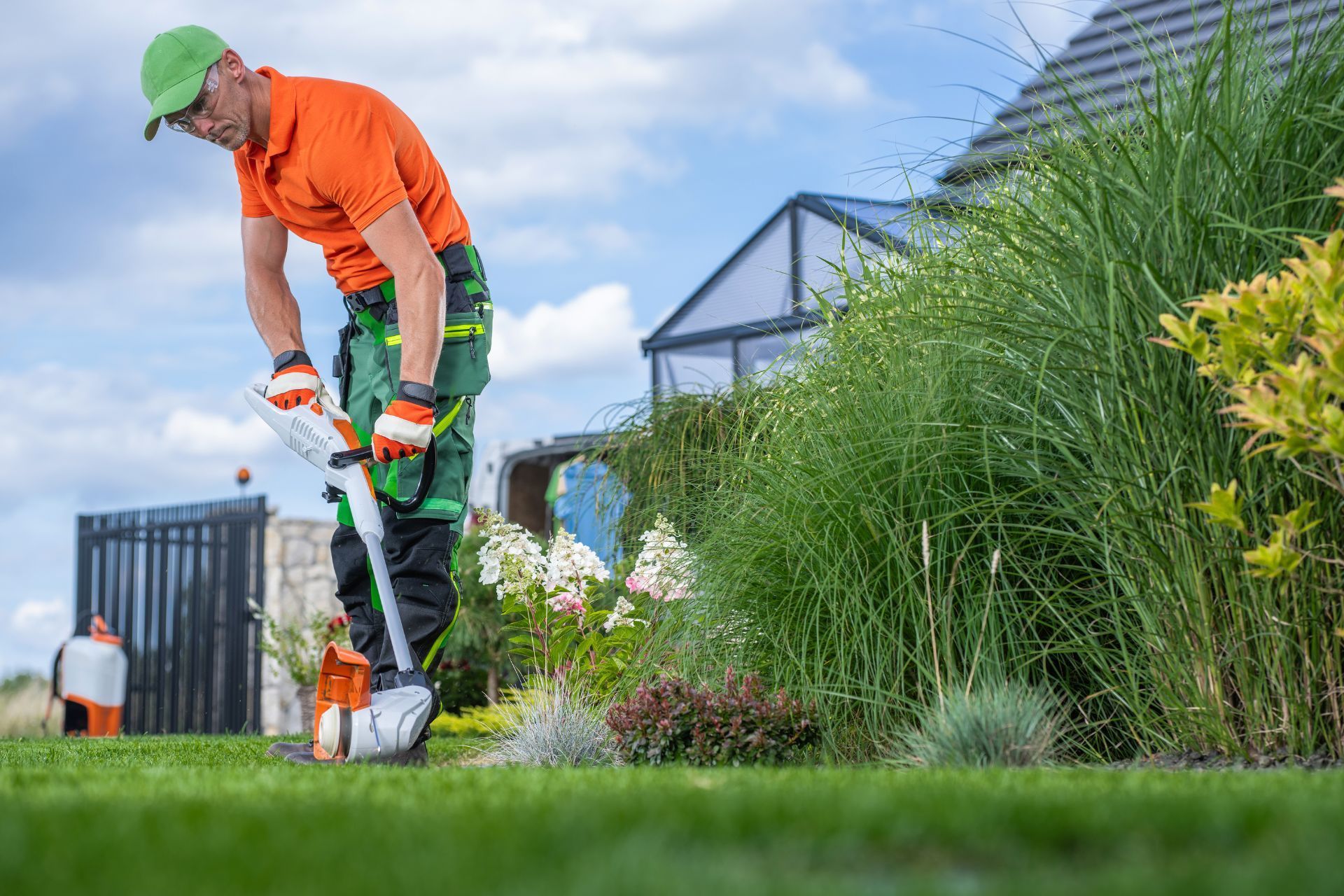 Professional edging of the green lawn in the Athens, GA garden, ensuring neat landscaping.
