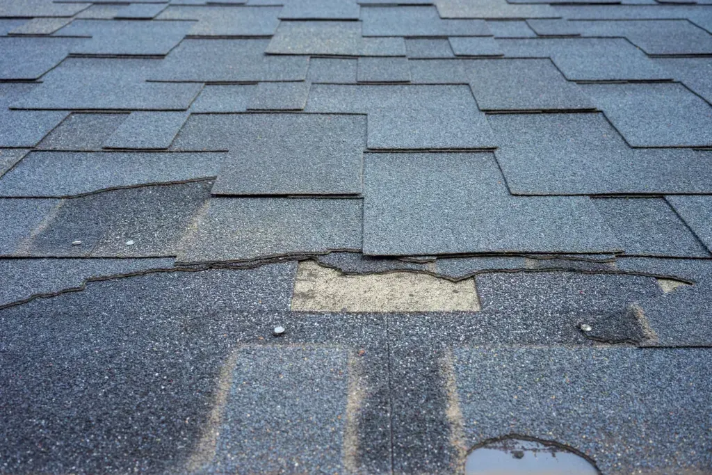 A close up of a roof with a hole in it.