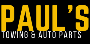 Paul's Towing & Auto Parts logo, yellow text on black background.