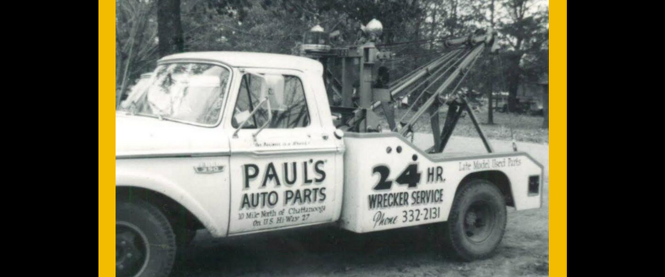 A vintage tow truck with 