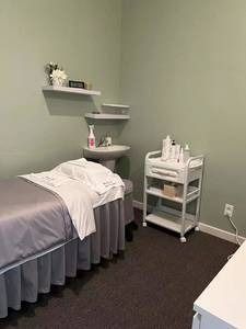 There is a bed in the middle of the room