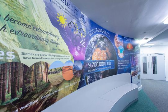 geography themed school wall mural installation