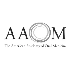 the logo for the american academy of oral medicine