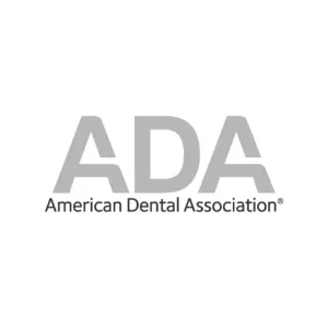 the logo for the american dental association is black and white .