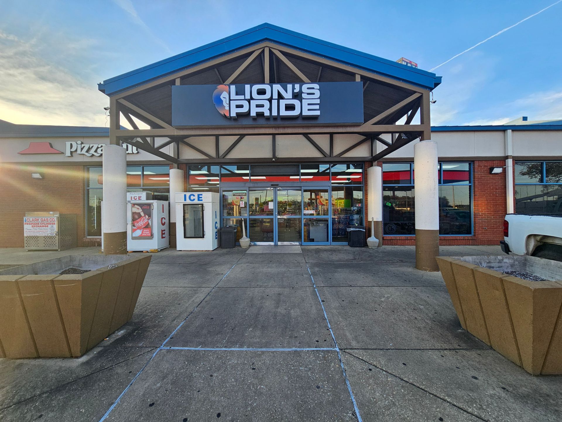 A store front with a sign that says lion 's pride