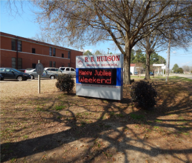 A sign that says r.b. hudson on it