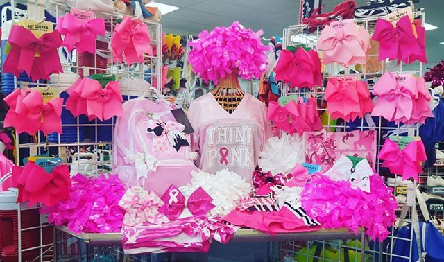 custom jersey, poms, bows