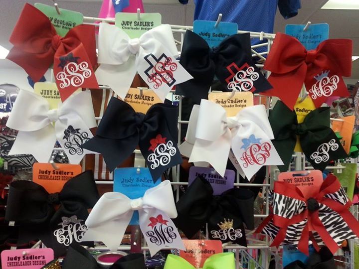 cross monogrammed bows