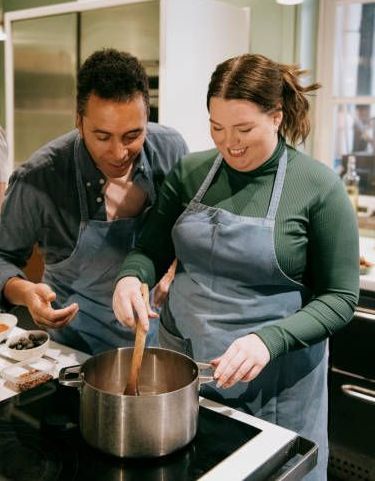 Support Worker assisting NDIS participant to cook a nourishing meal