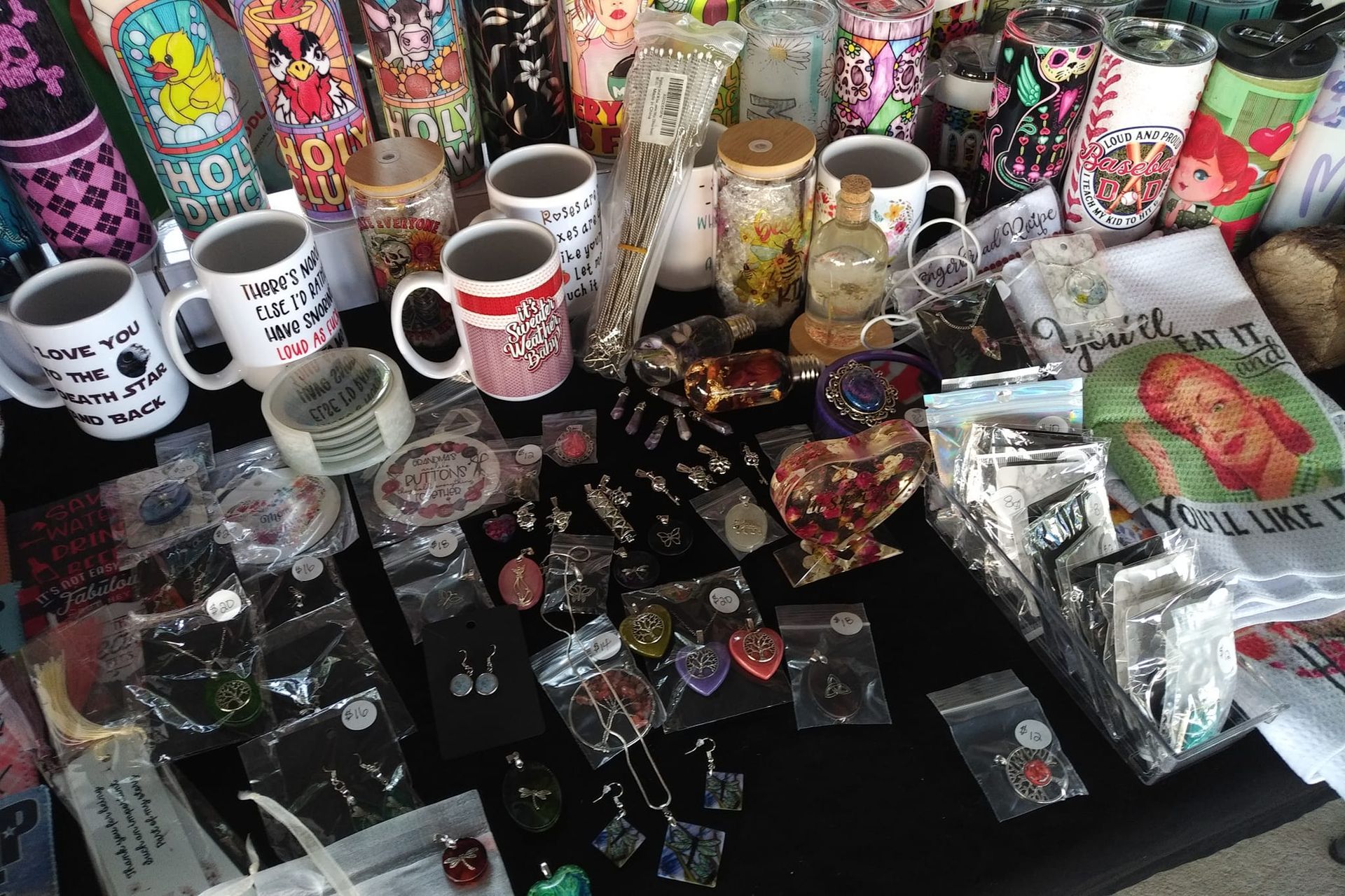 mugs and earrings made by ann