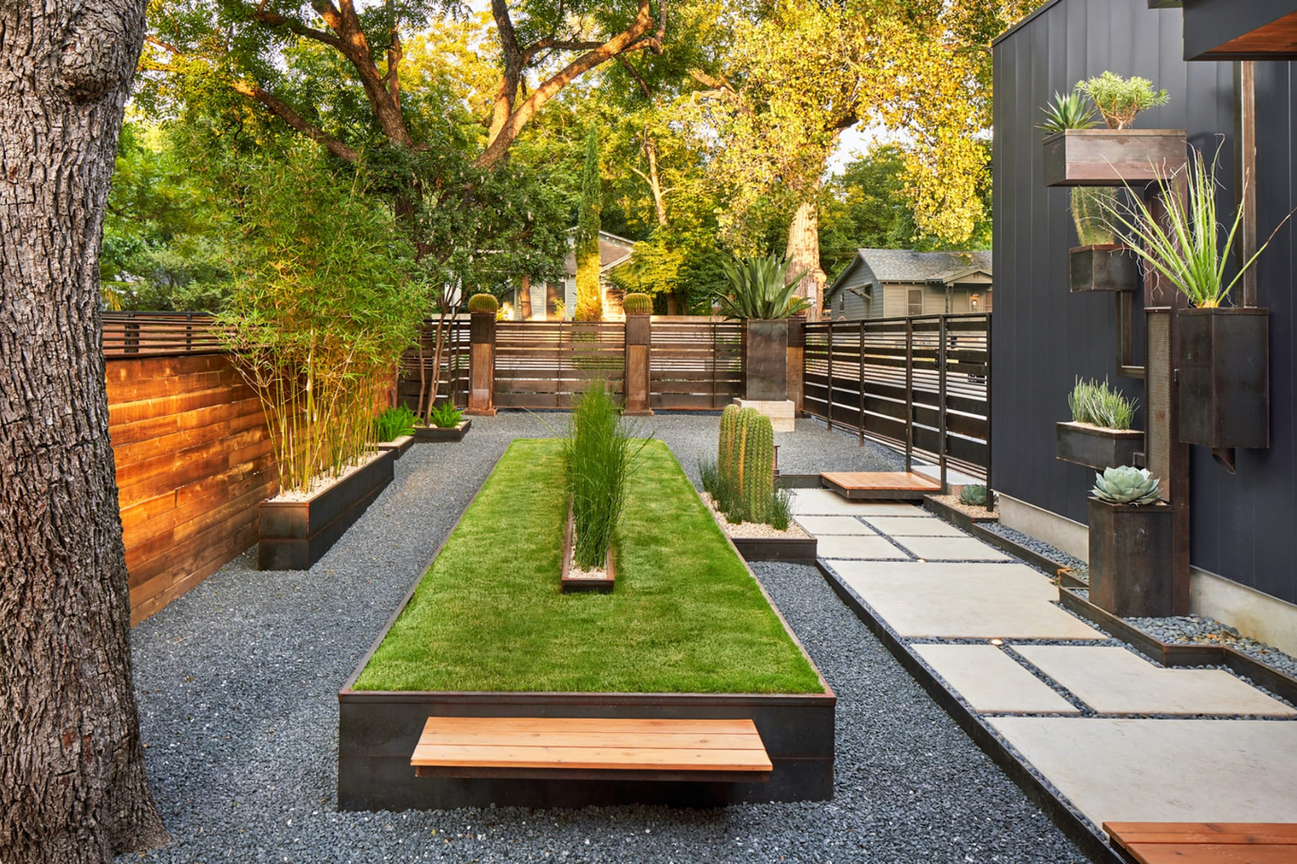 There is a bench in the middle of the garden.