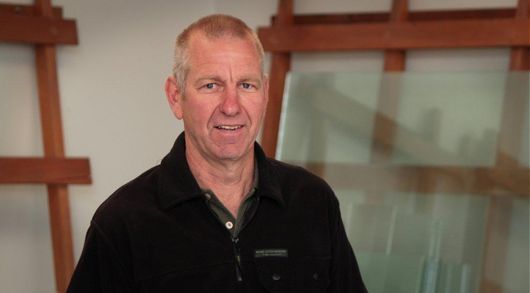 Man calling the experts for glass and window repairs in Christchurch