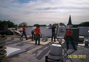 workers on commercial roof - commercial roofing in Dyer, IN