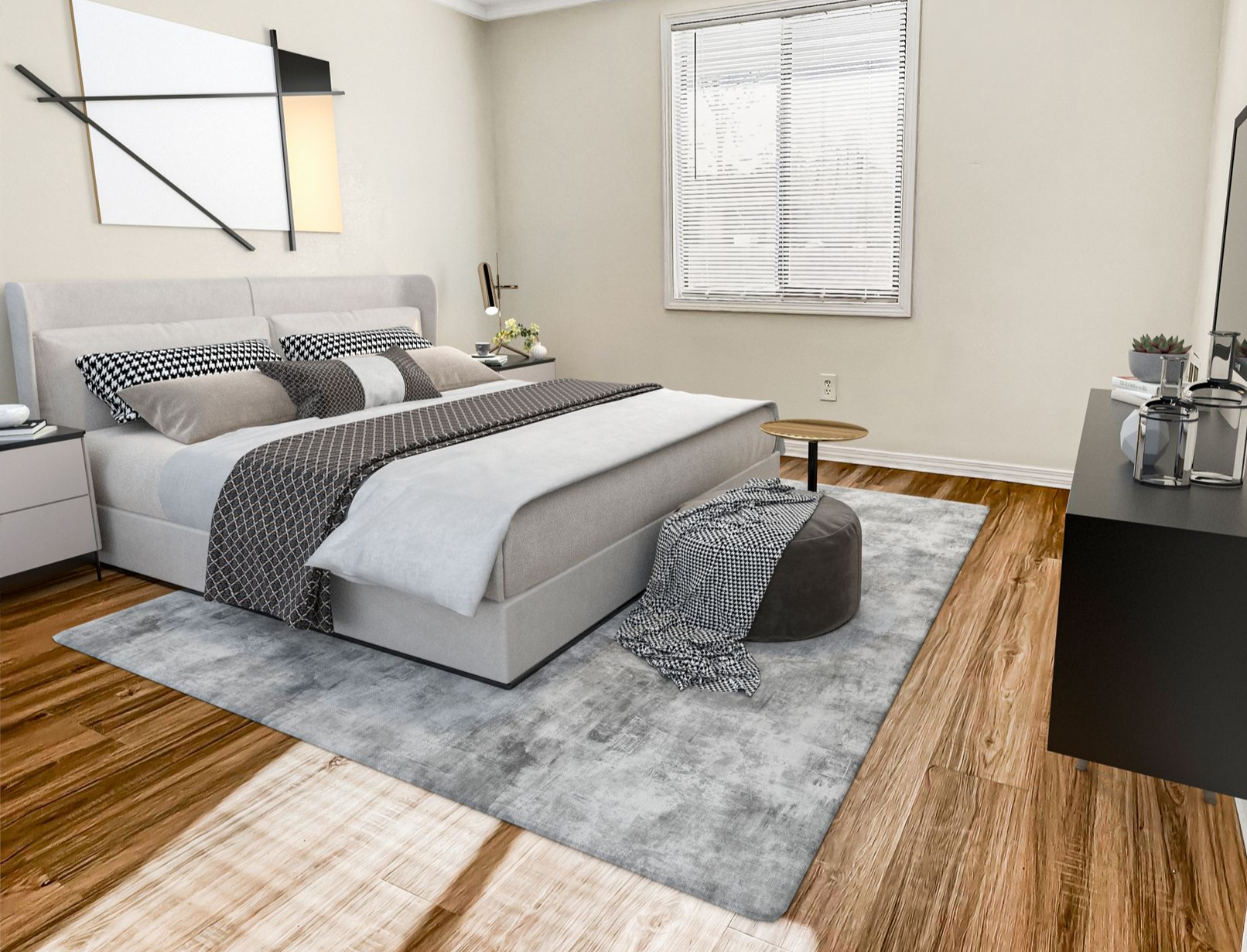 Photo of a bedroom with a large bed and still plenty of open space, as well as plenty of natural lighting