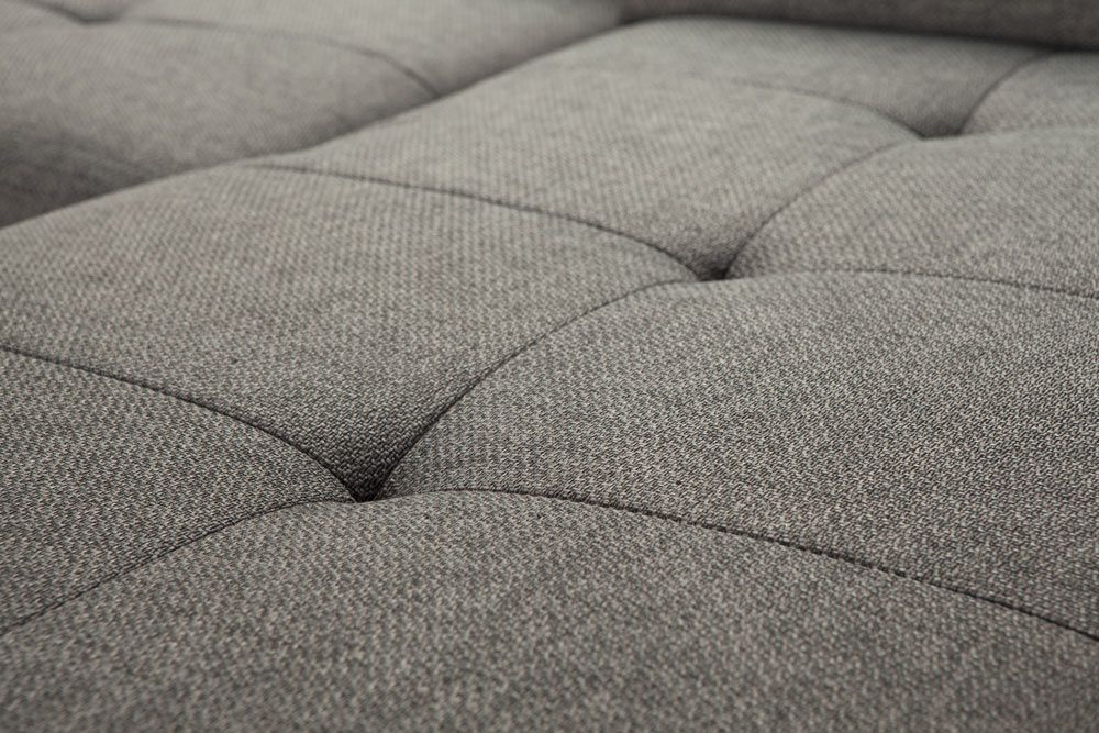 A Close Up Of A Grey Couch With Buttons On It — Coastal Upholstery In Berkeley Vale, NSW