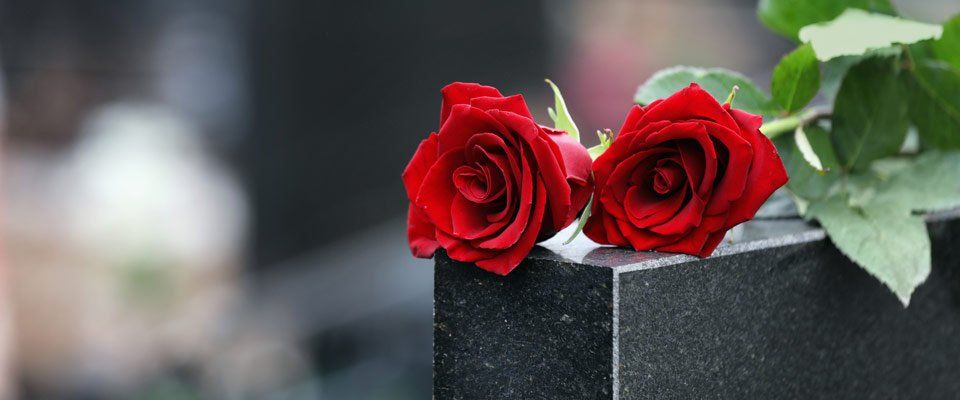planning a graveside service red roses