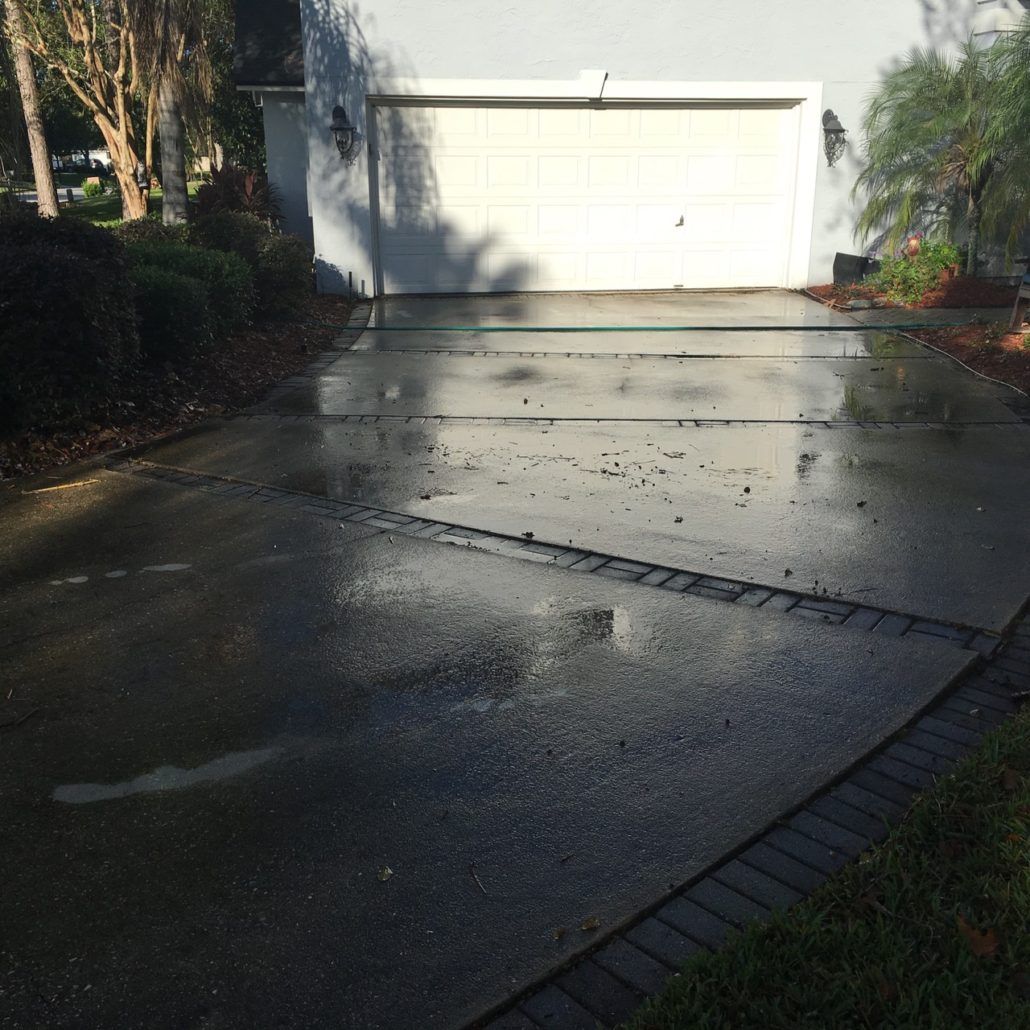 Stewart Pressure Cleaning Before pressure washing service of driveway