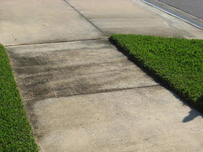 Stewart Pressure Cleaning Before pressure washing service of sidewalk