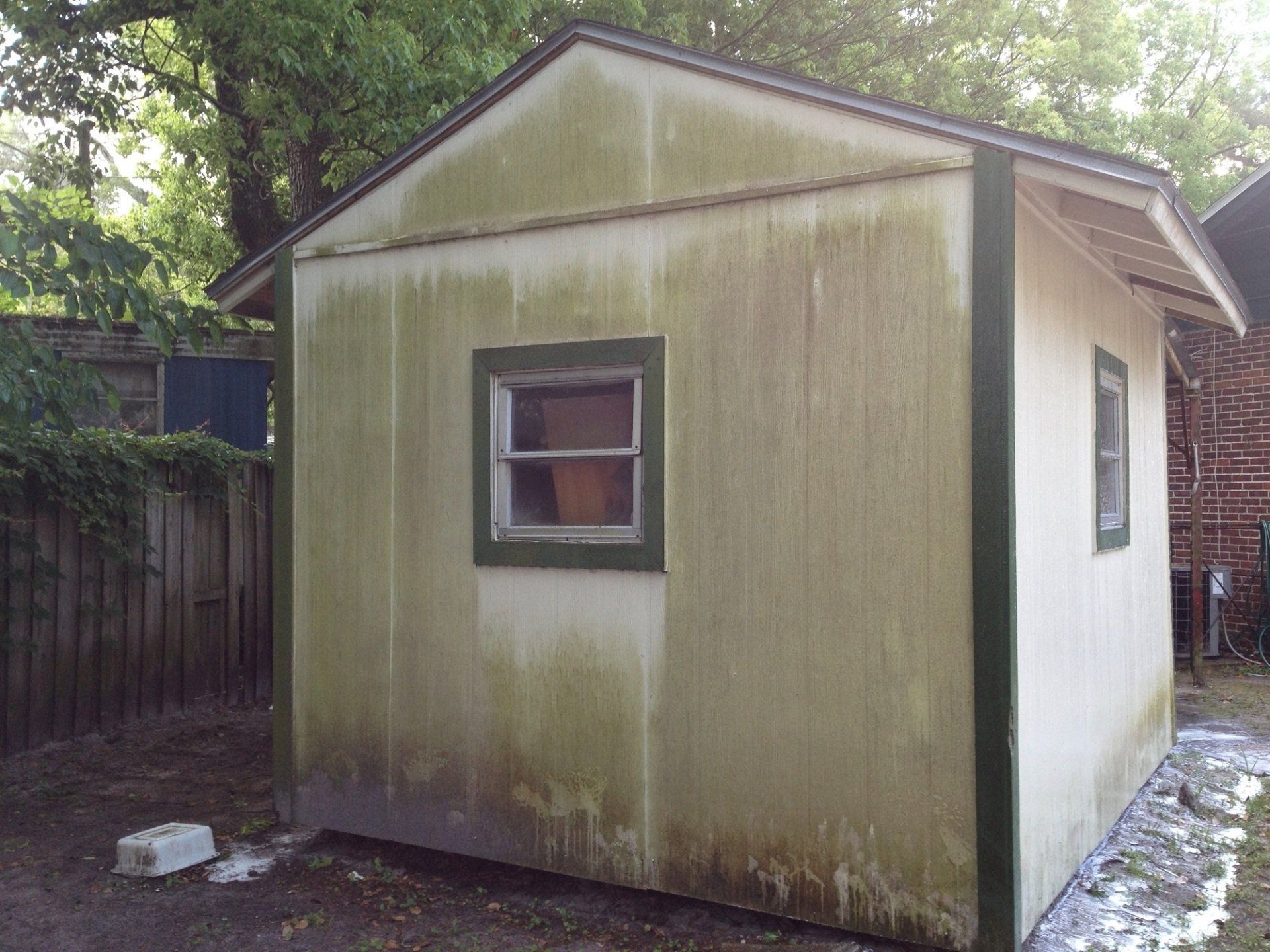 Stewart Pressure Cleaning Before pressure washing service of shed